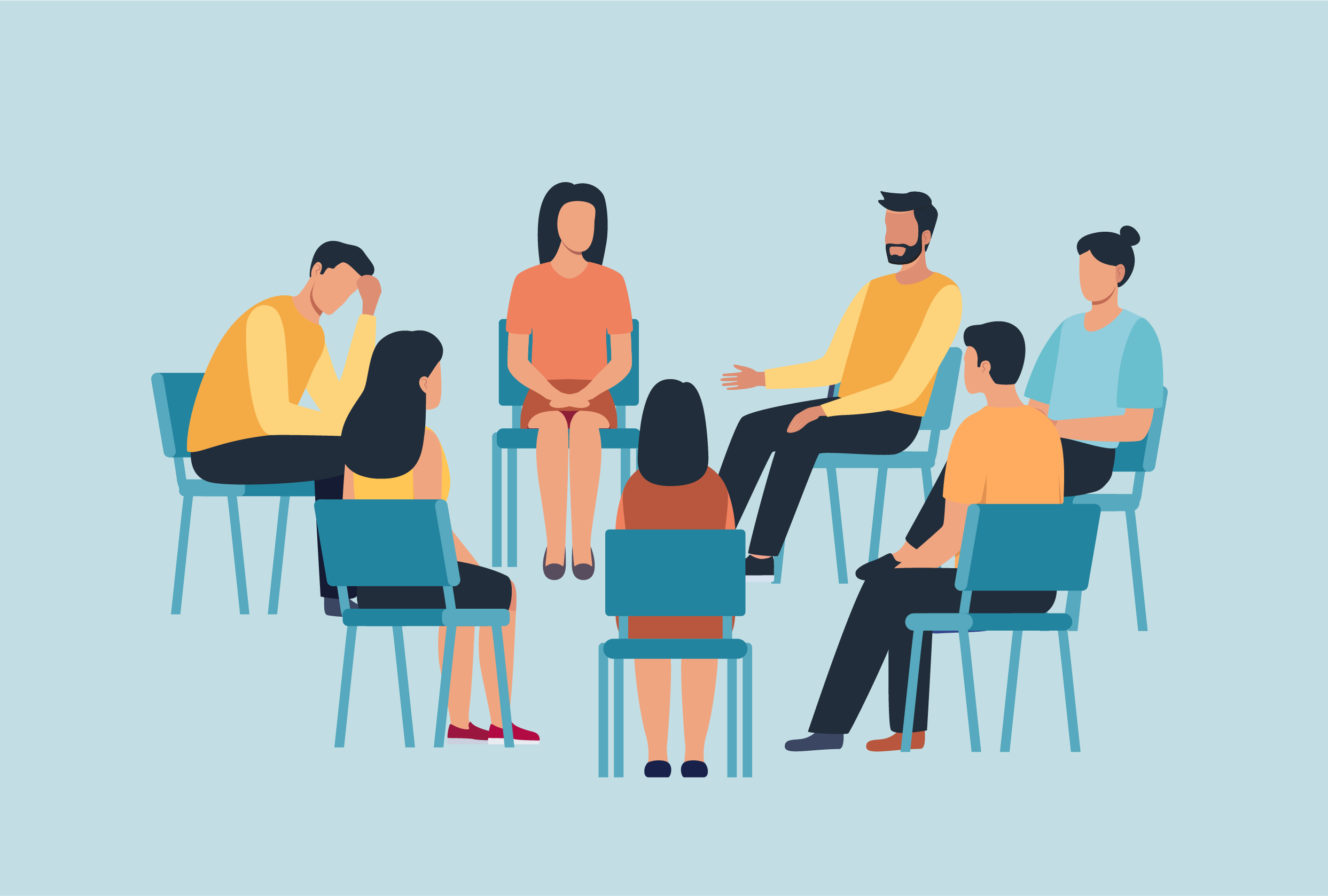 Grupa osób siedzących w kręgu