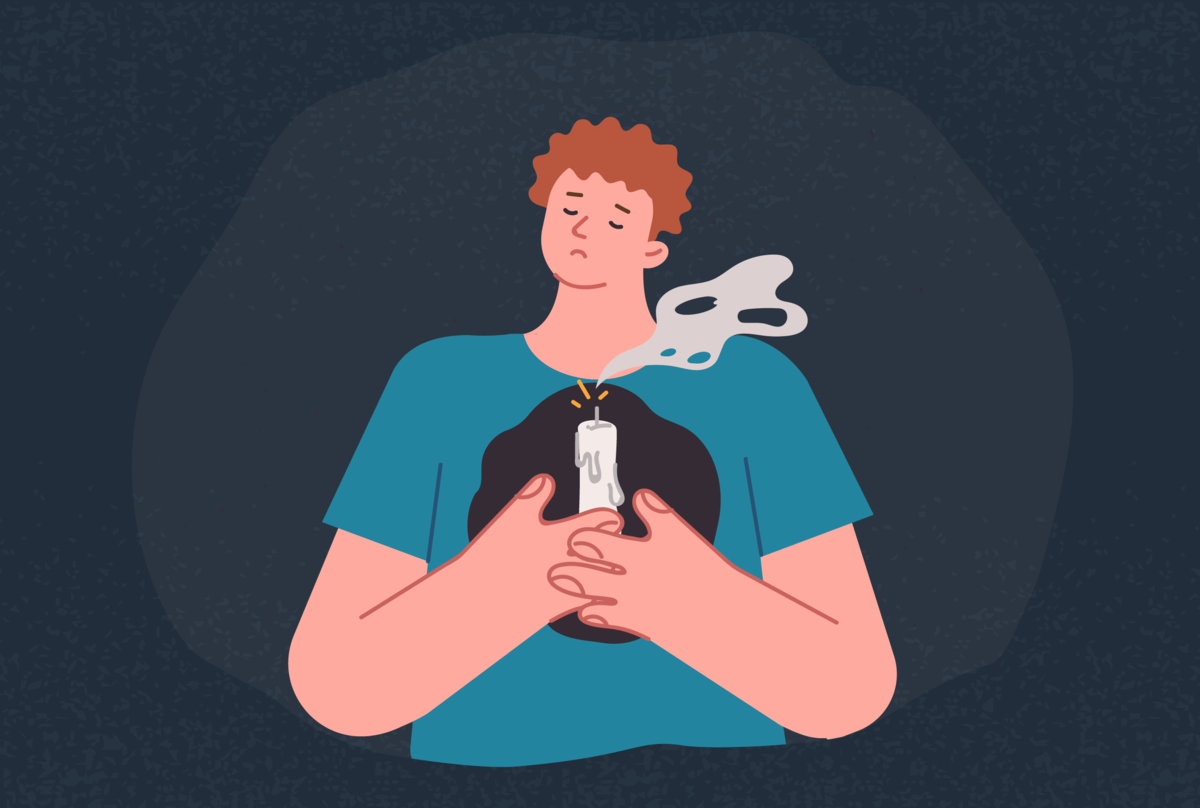 Na obrazku widzimy mężczyznę lub chłopca, który pogrążony jest w smutku. Trzyma świecę.