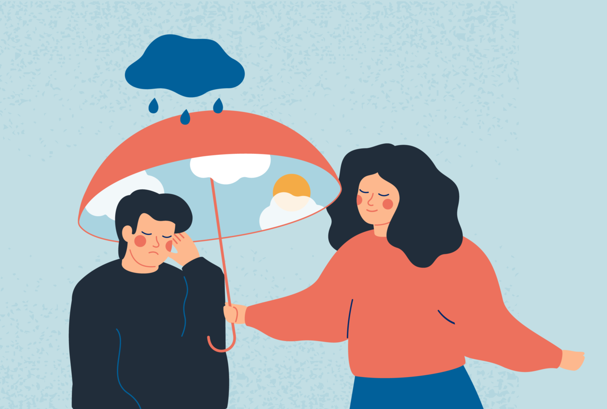 Na zdjęciu smutna osoba, na którą pada deszcz. Obok niej, nad jej głową, parasolkę trzyma uśmiechnięta osoba.