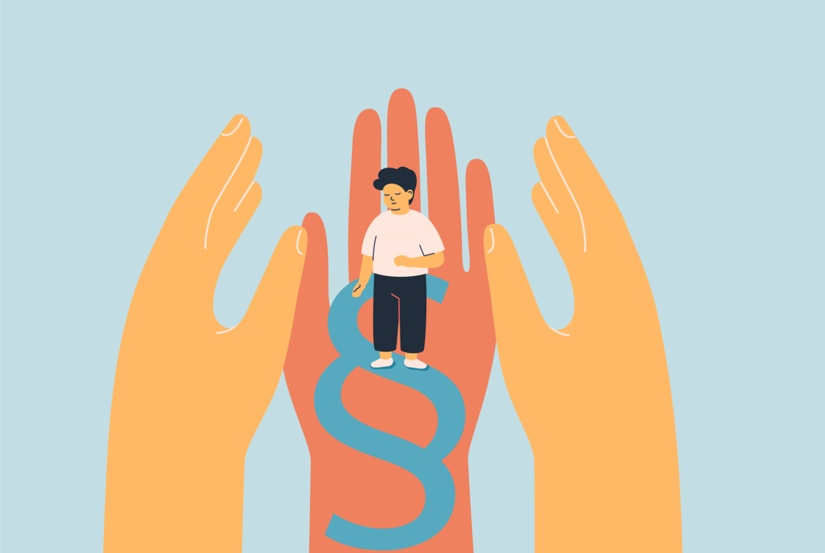 Na obrazku widzimy dłonie, na jednej z nich stoi dziecko i jest na niej znak paragrafu. Jest to metafora ochrony prawnej dziecka.